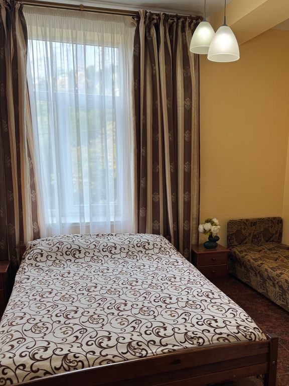 Трёхместный номер стандарт с видом на горы