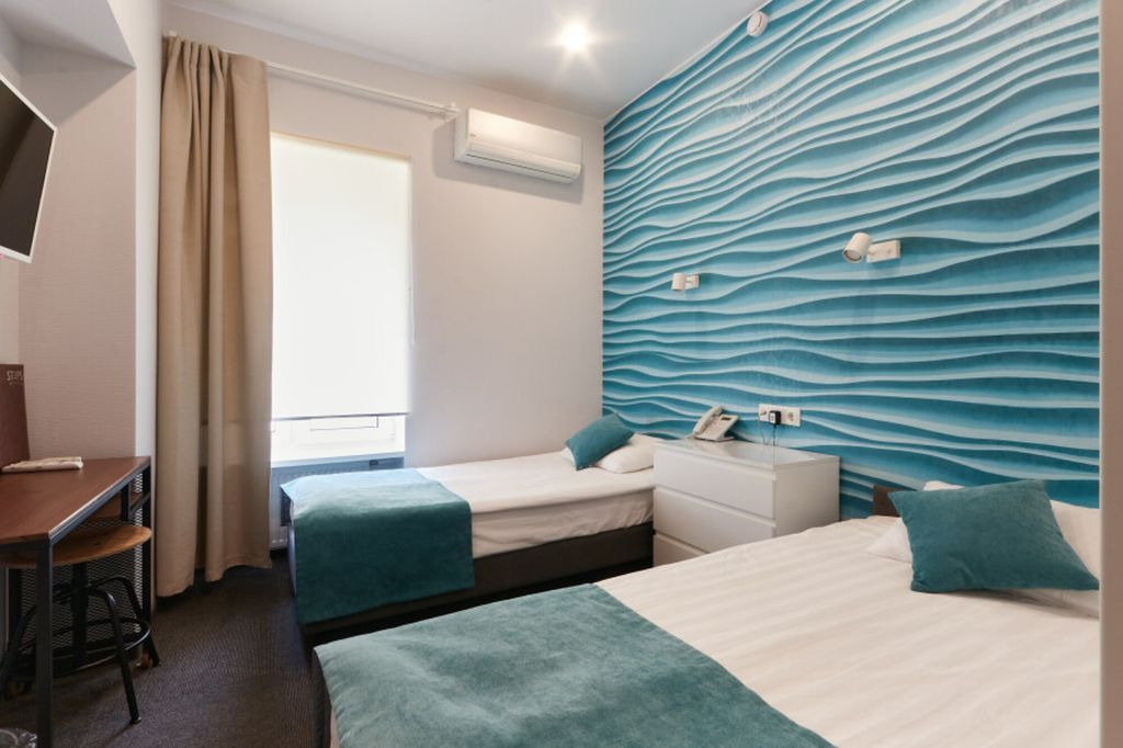 Двухместный номер с 2 отдельными кроватями стандарт