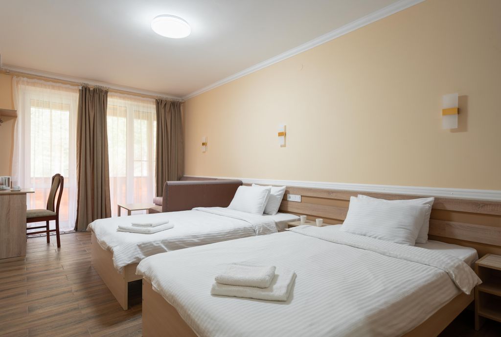 Двухместный номер с 2 отдельными кроватями улучшенный