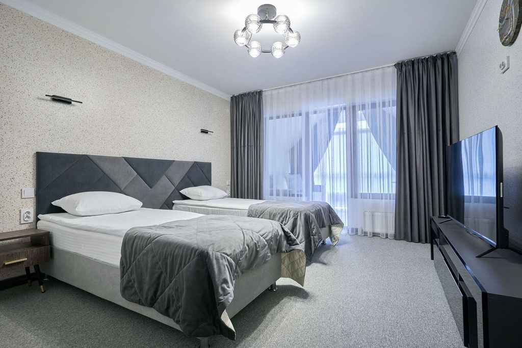 Четырёхместный номер комфорт с двумя раздельными кроватями