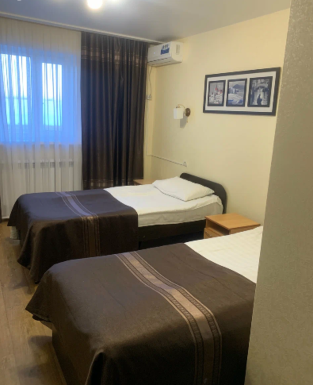 Двухместный номер с 2 отдельными кроватями стандарт с удобствами