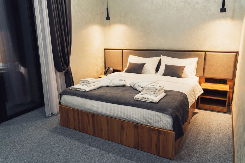 Четырёхместный номер Люкс двухкомнатный со спа-бассейном и террасой