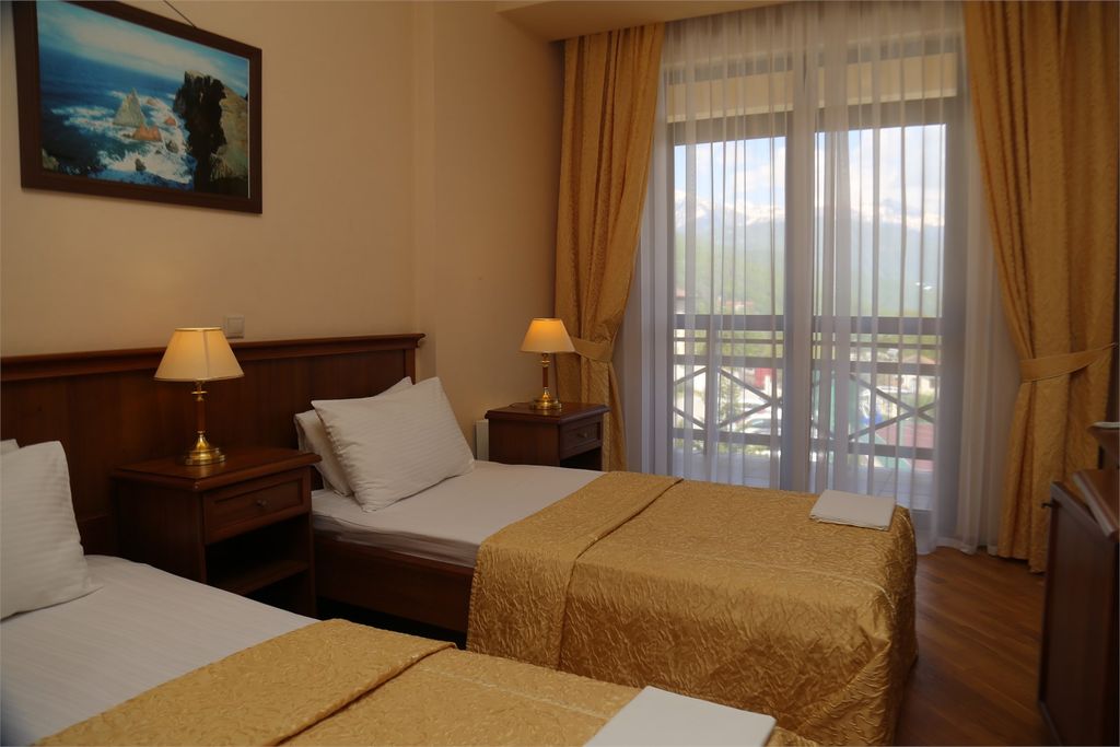 Двухместный номер с 2 отдельными кроватями Стандарт с балконом в пятом корпусе