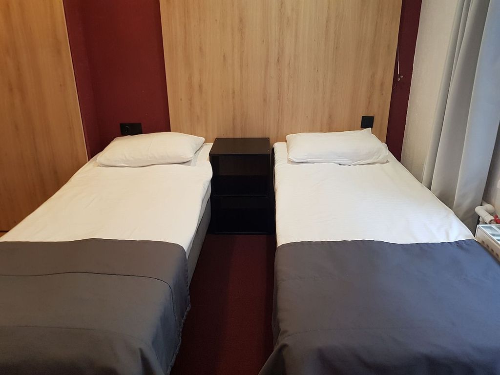 Двухместный номер с 2 отдельными кроватями стандарт