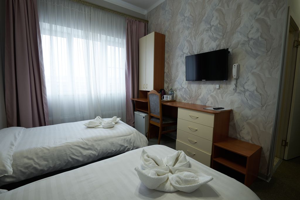 Двухместный номер с 2 отдельными кроватями Улучшенный Стандарт