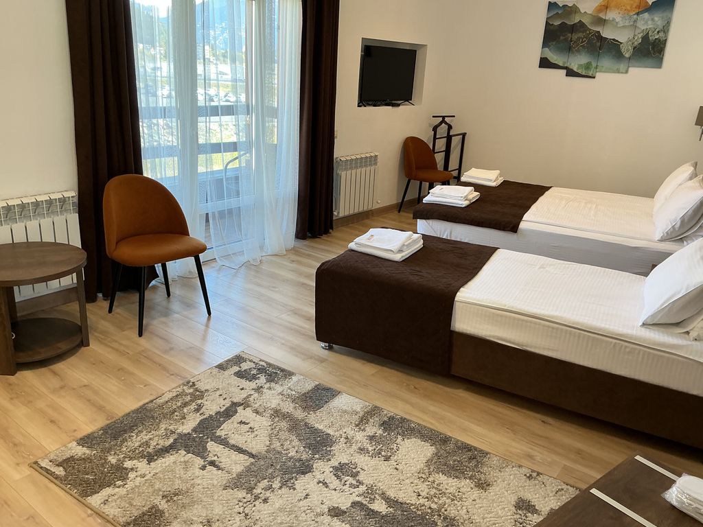 Трёхместный номер с кухонным уголком