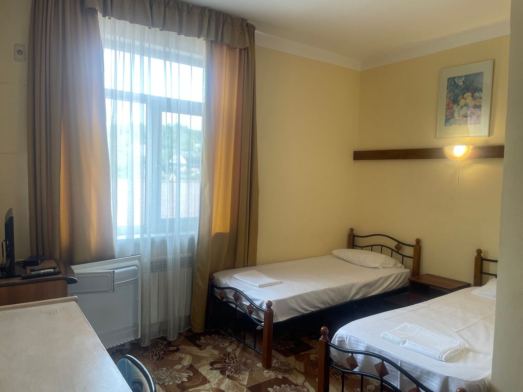 Двухместный номер с 2 отдельными кроватями стандарт