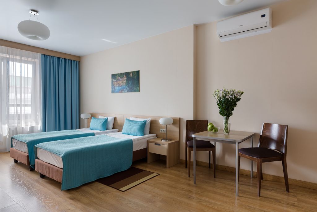 Двухместный номер с 2 отдельными кроватями улучшенный