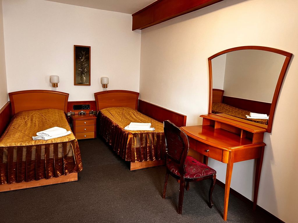 Двухместный номер с 2 отдельными кроватями стандарт