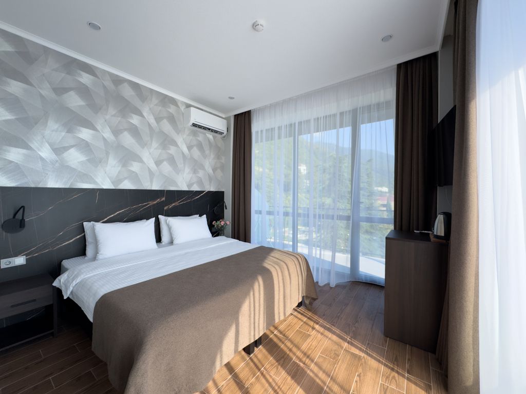 Четырёхместный номер Люкс двухкомнатный