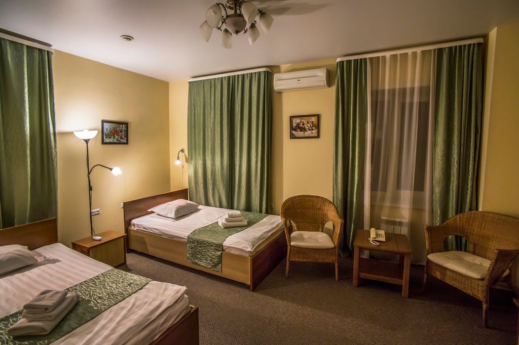 Двухместный номер с 2 отдельными кроватями улучшенный