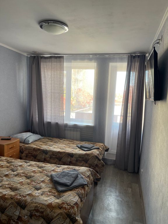 Четырёхместный номер с четырьмя раздельными кроватями