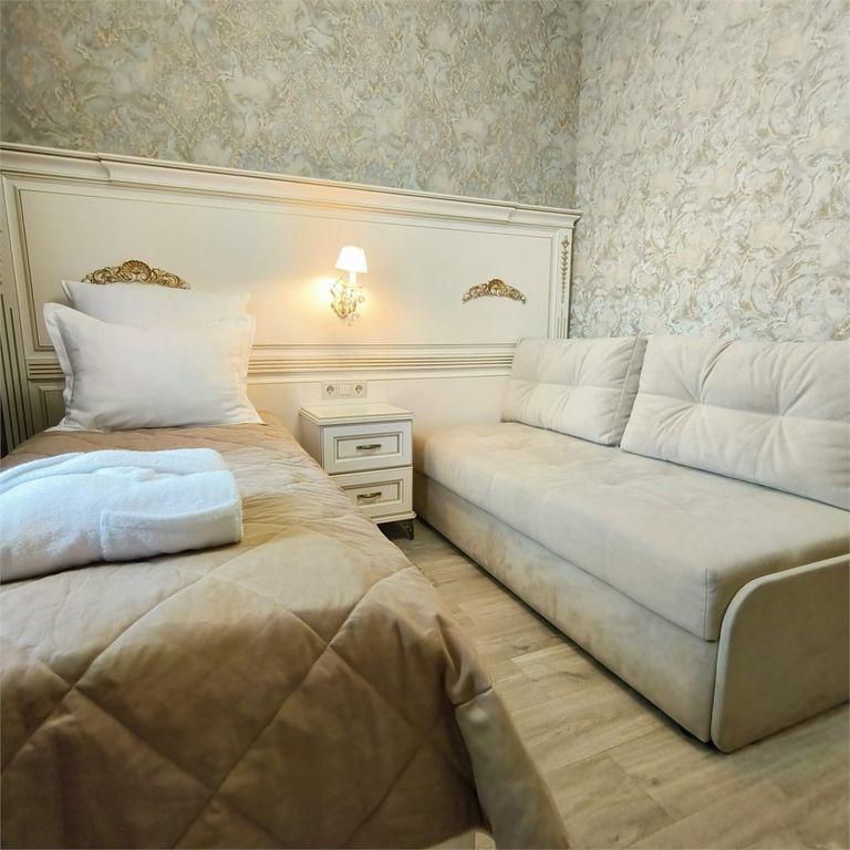 Одноместный номер Стандарт одноместный с диванчиком ( с доп.местом для ребенка до 12 лет)