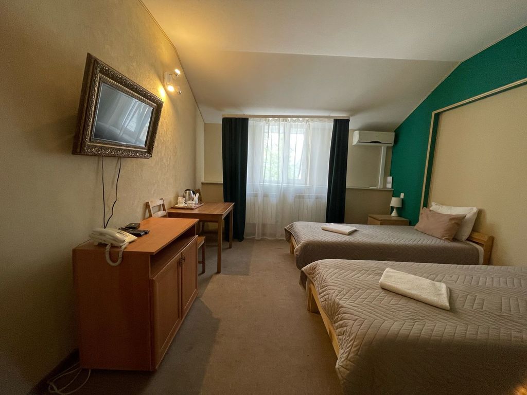 Двухместный номер с 2 отдельными кроватями стандарт