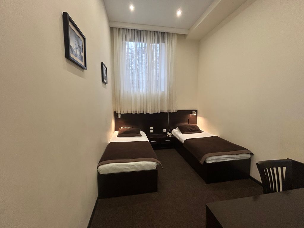 Двухместный номер с 2 отдельными кроватями стандарт