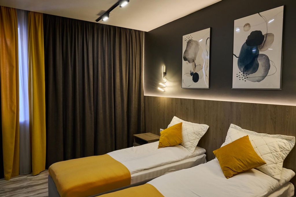 Двухместный номер с 2 отдельными кроватями улучшенный