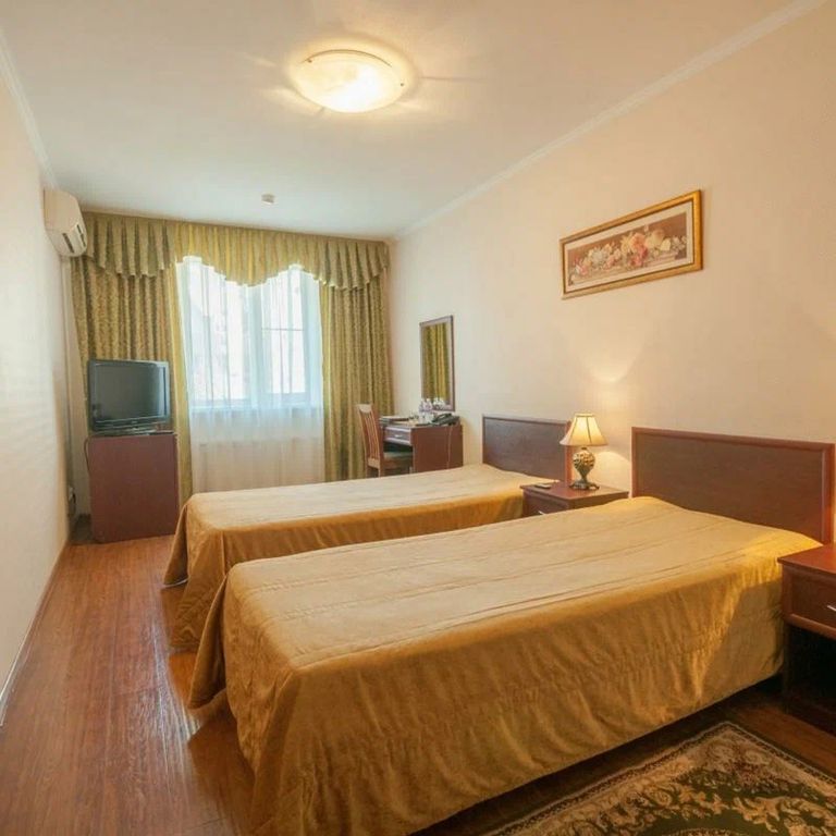 Двухместный номер с 2 отдельными кроватями стандарт