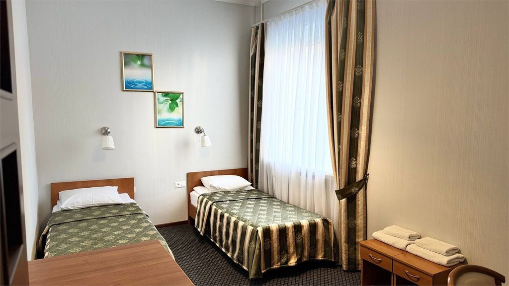 Двухместный номер с 2 отдельными кроватями Стандарт