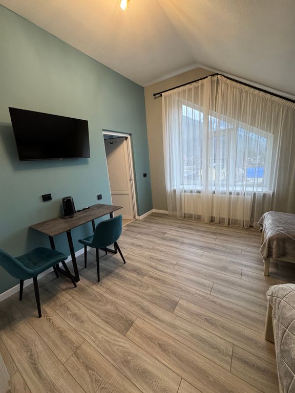 Четырёхместный номер стандарт с видом на горы