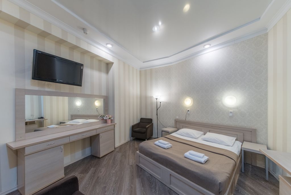 Двухместный номер с 1 кроватью Стандарт с двуспальной кроватью