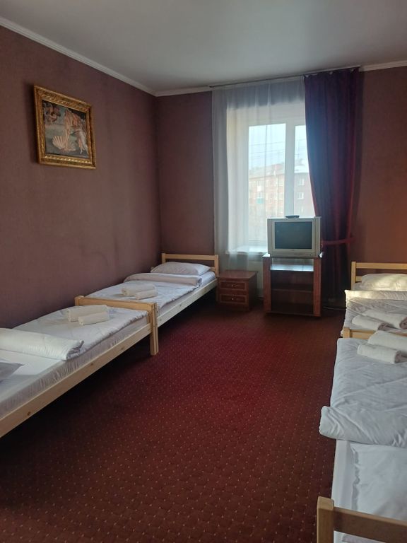 Четырёхместный номер Стандартный с 4 отдельными кроватями