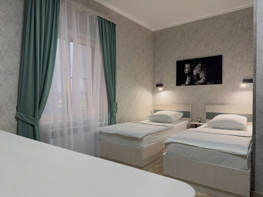 Двухместный номер с 2 отдельными кроватями улучшенный