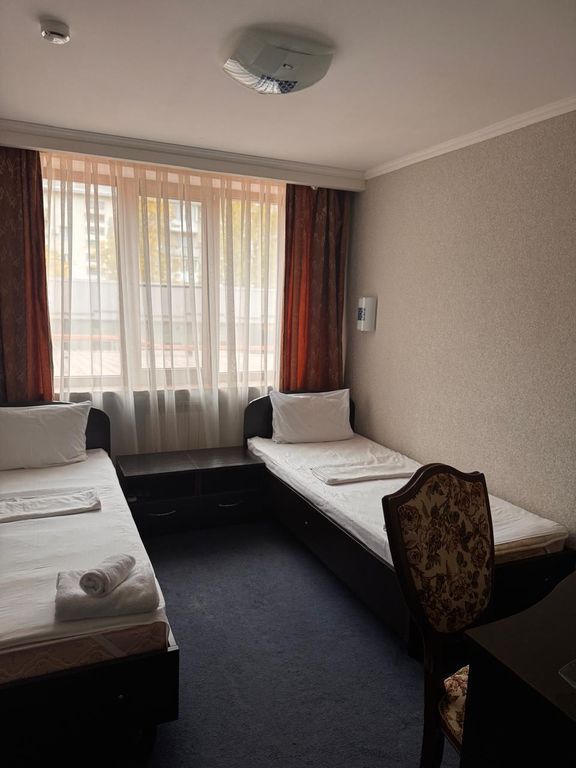 Двухместный номер с 2 отдельными кроватями стандарт