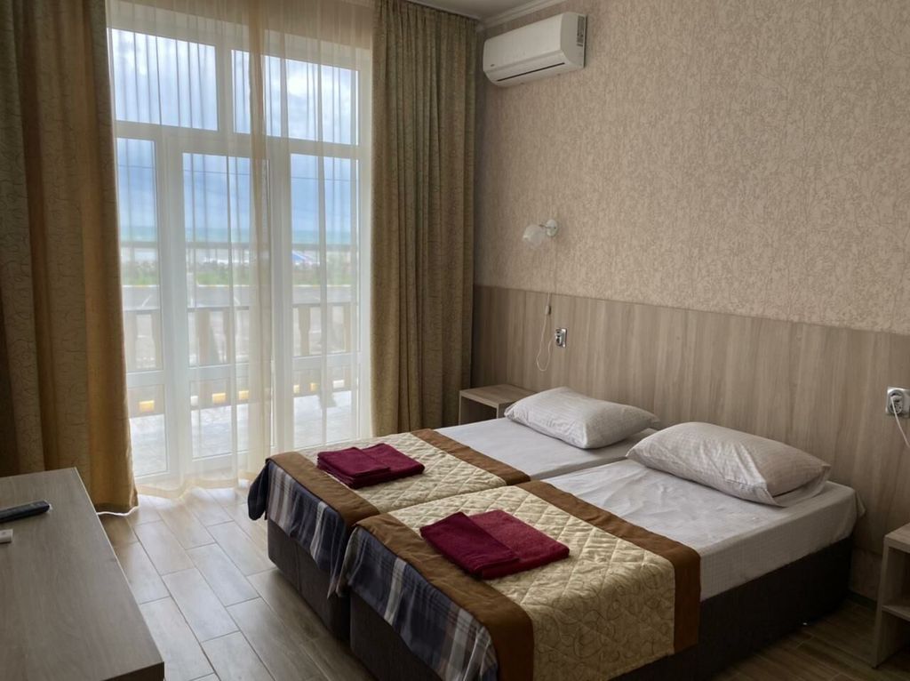 Двухместный номер с 2 отдельными кроватями стандарт с видом на море