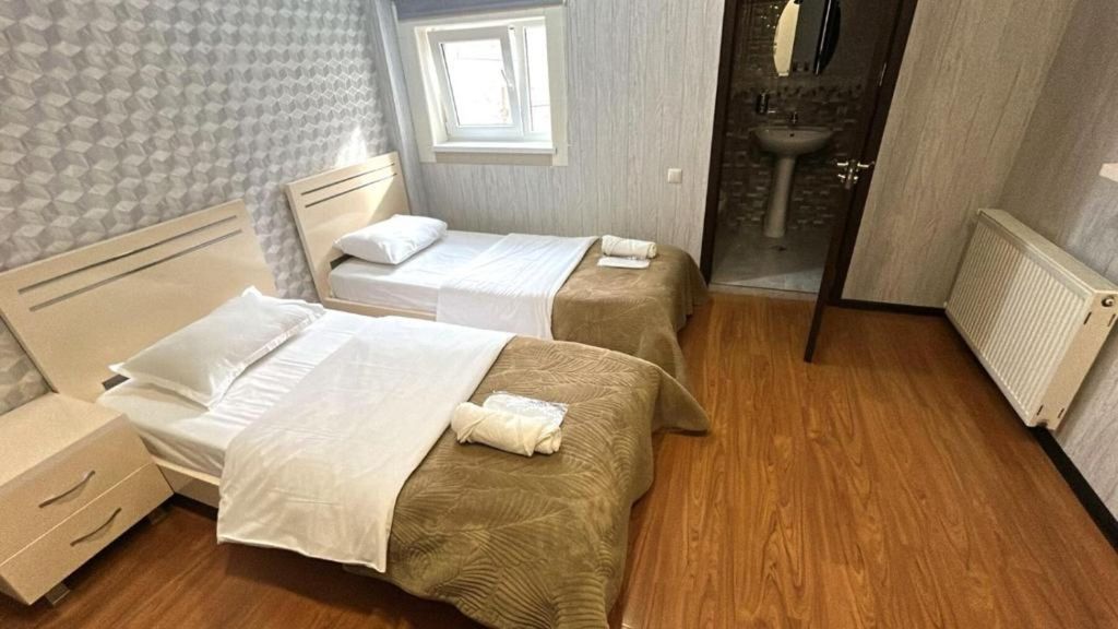 Двухместный номер с 2 отдельными кроватями стандарт