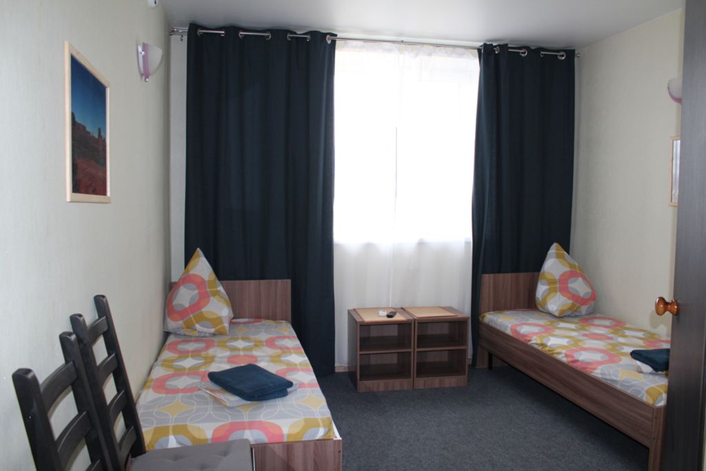 Двухместный номер с 2 отдельными кроватями стандарт