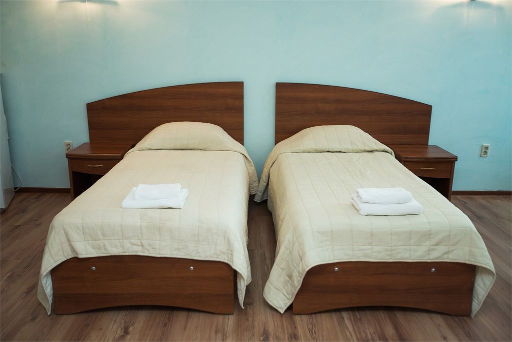 Двухместный номер с 2 отдельными кроватями улучшенный стандарт