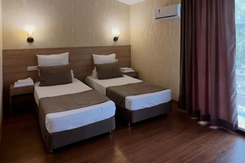Двухместный номер с 2 отдельными кроватями стандарт