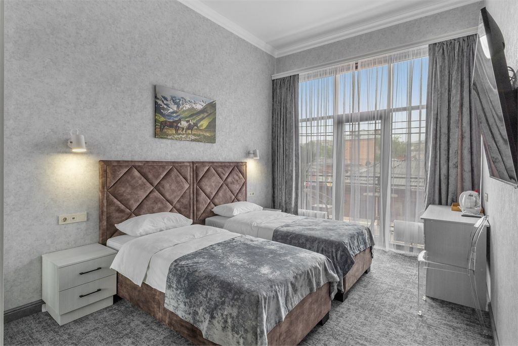 Двухместный номер с 2 отдельными кроватями стандарт