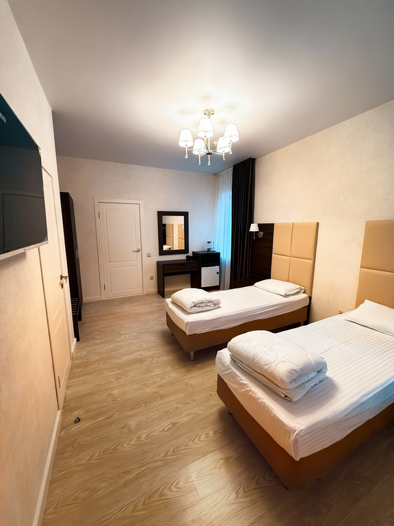 Двухместный номер с 2 отдельными кроватями Стандарт улучшенный