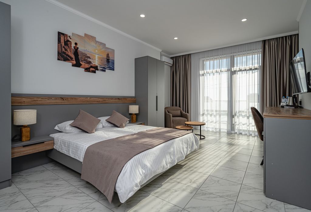 Четырёхместный номер двухкомнатный люкс