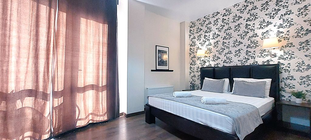 Двухместный номер с 1 кроватью улучшенный с балконом