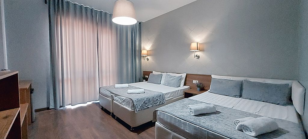 Четырёхместный номер улучшенный с балконом