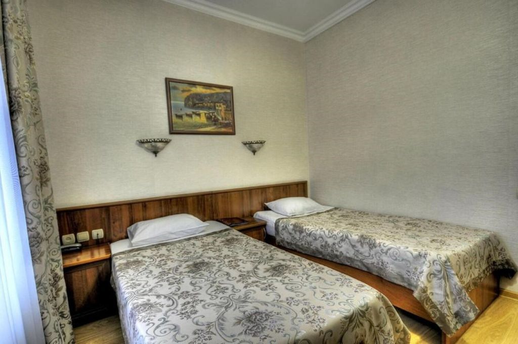 Двухместный номер с 2 отдельными кроватями стандарт