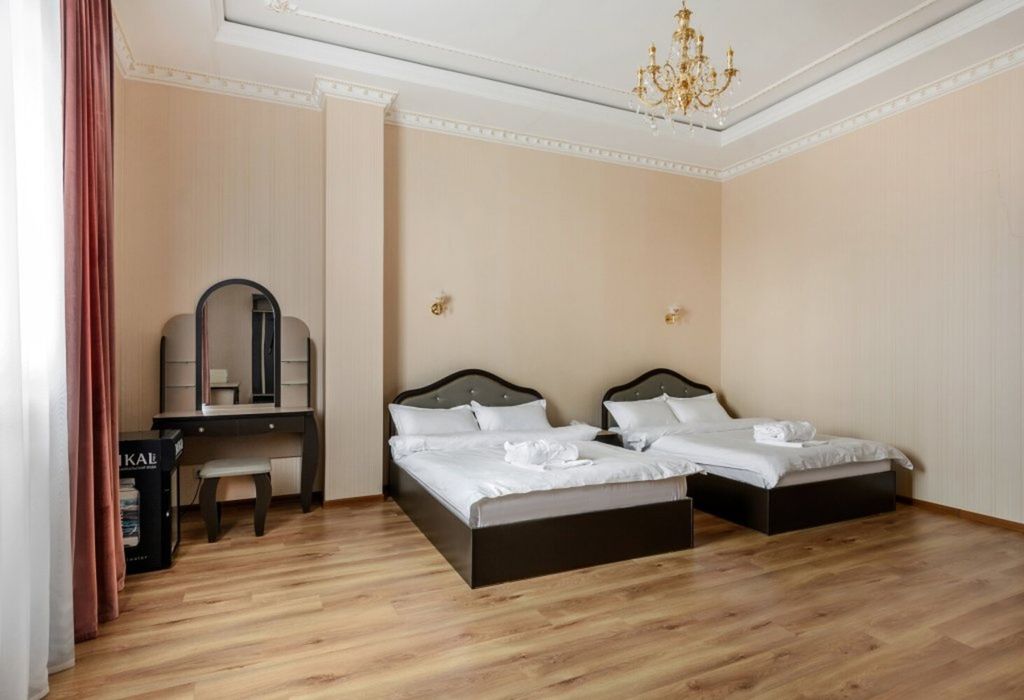 Двухместный номер с 2 отдельными кроватями полулюкс