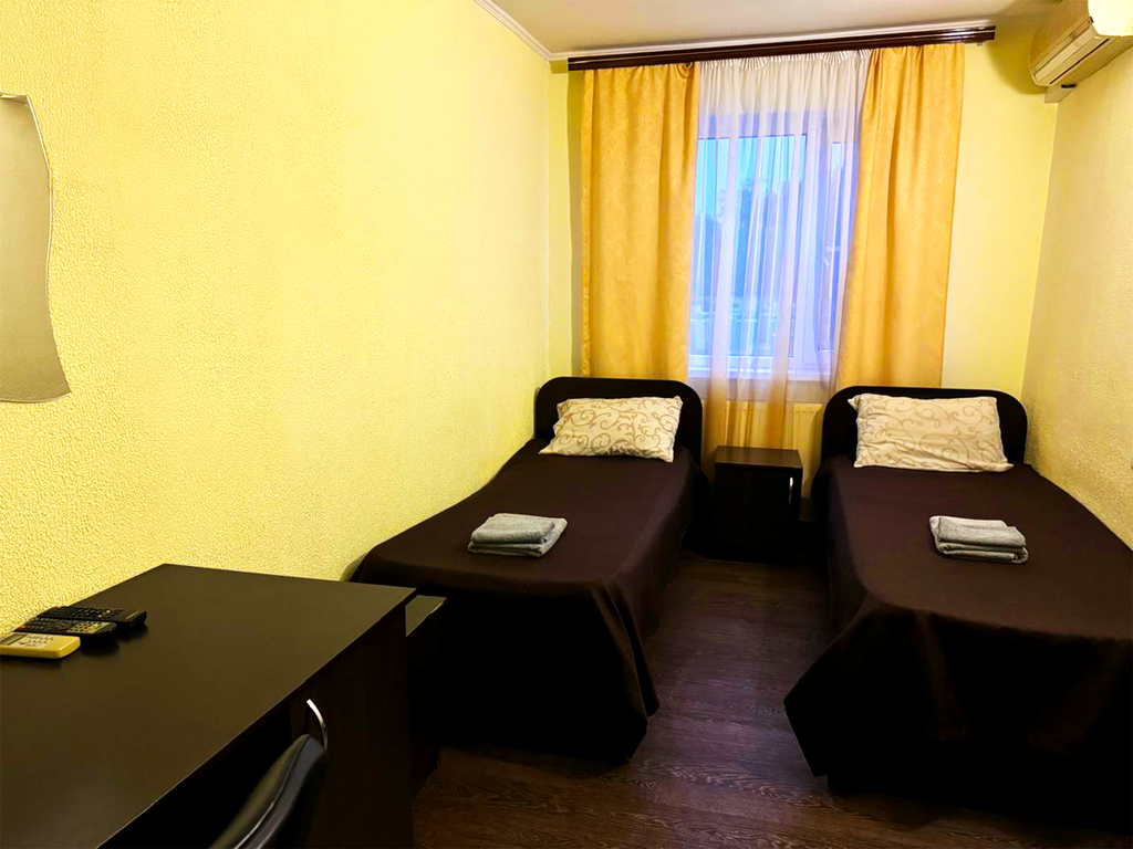 Двухместный номер с 2 отдельными кроватями эконом