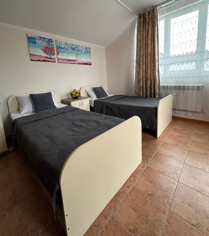 Трёхместный номер с тремя раздельными кроватями