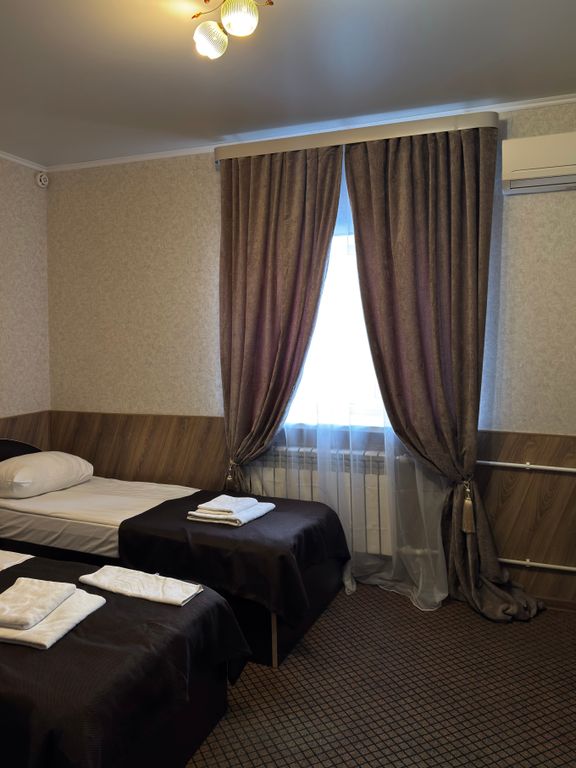 Двухместный номер с 2 отдельными кроватями стандарт