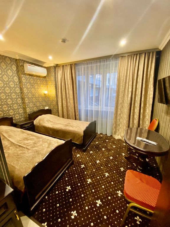 Двухместный номер с 2 отдельными кроватями стандарт