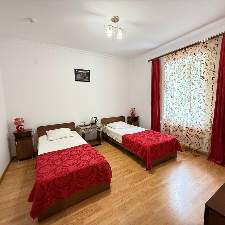 Двухместный номер с 2 отдельными кроватями стандарт