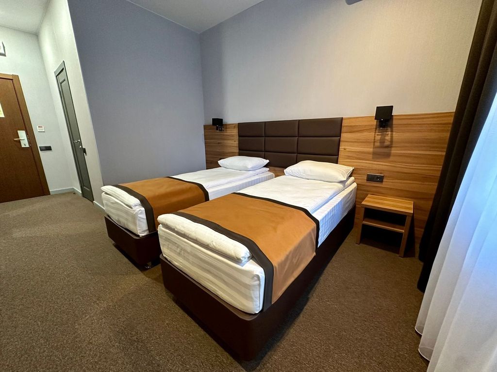 Двухместный номер с 2 отдельными кроватями комфорт