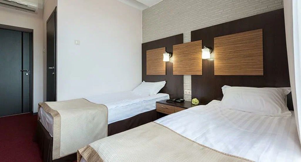 Двухместный номер с 2 отдельными кроватями комфорт