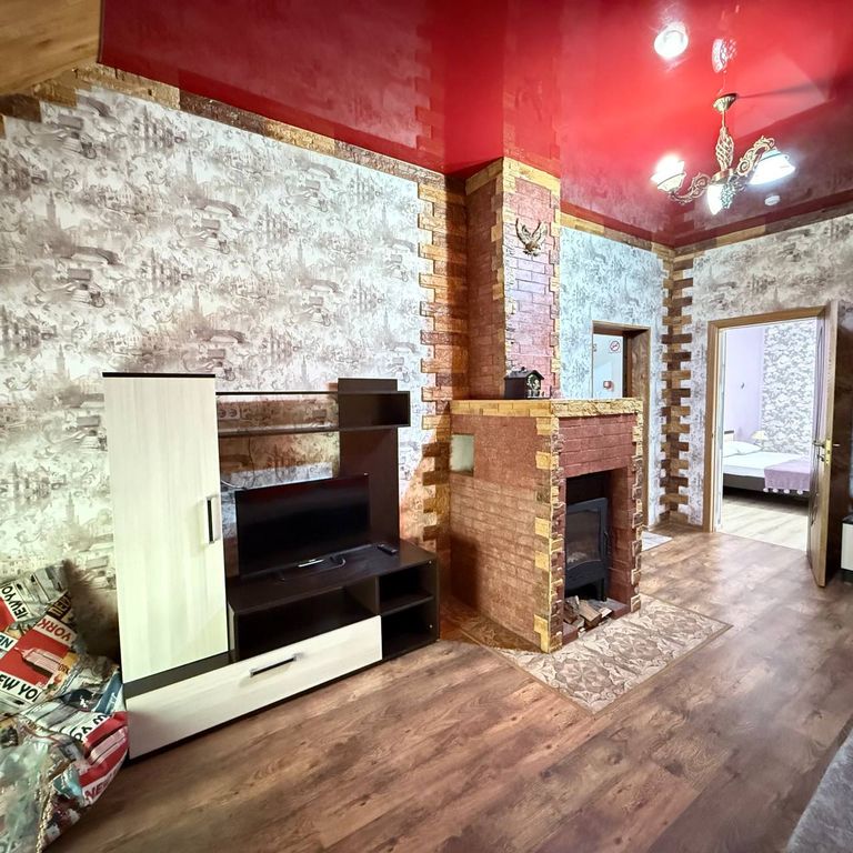 Трёхместный номер кантри люкс с камином