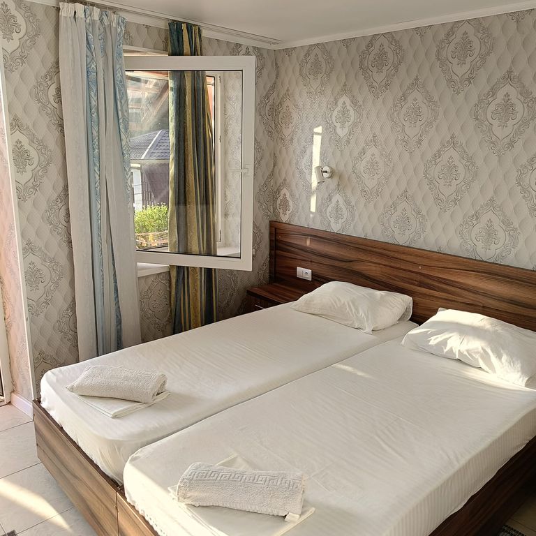 Двухместный номер с 2 отдельными кроватями стандарт с видом на море