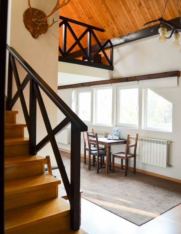 Четырёхместный номер двухуровневый люкс