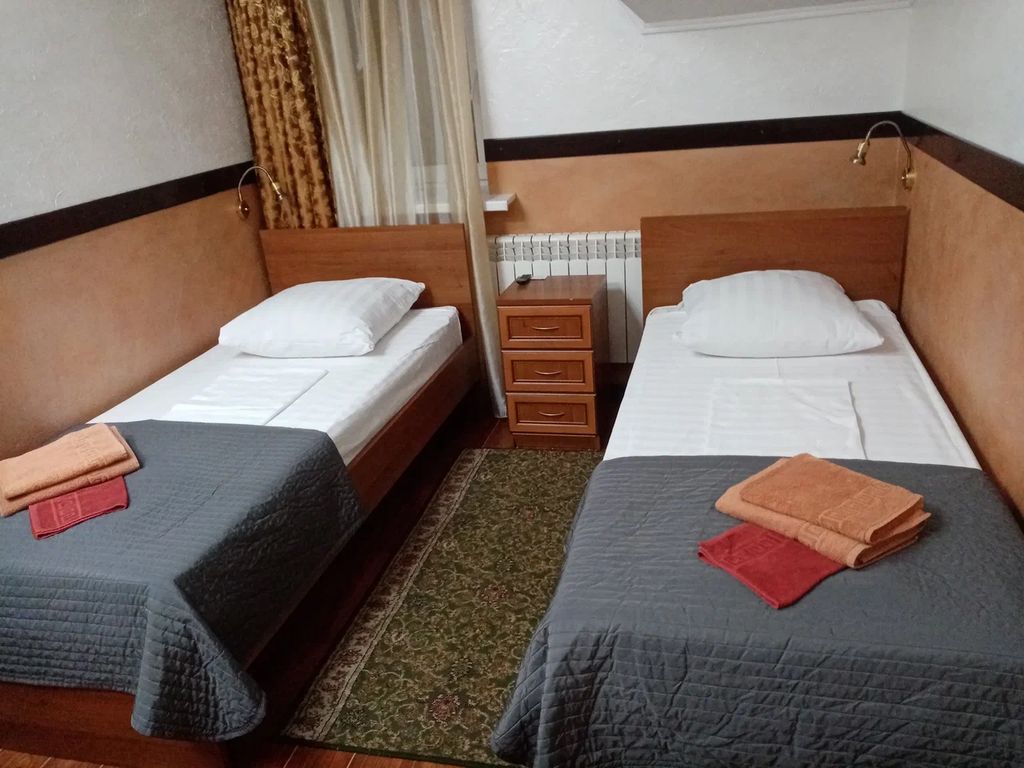 Двухместный номер с 2 отдельными кроватями полулюкс